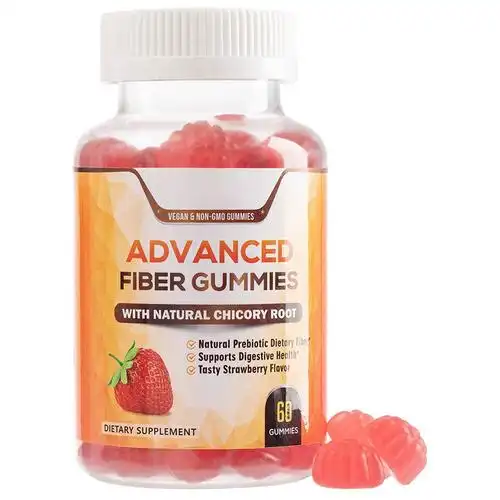 A slice of keto vanilla cake served on a white plate with a fork.